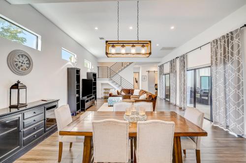 a dining room and living room with a table and chairs at Serene Austin Stunner in Austin