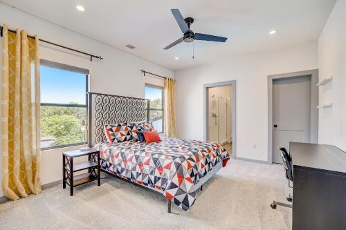 a bedroom with a bed and a window at Serene Austin Stunner in Austin