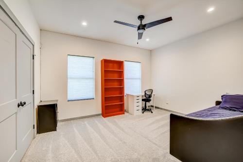 a bedroom with a bed and a window at Serene Austin Stunner in Austin