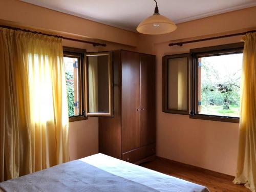 Ένα ή περισσότερα κρεβάτια σε δωμάτιο στο Horizon Blue Loft