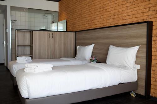 ONOMO Hotel Tanger Medにあるベッド