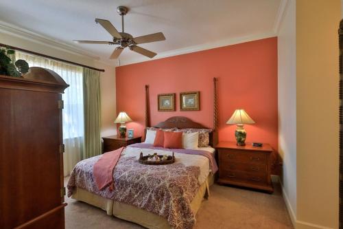 a bedroom with a bed and a ceiling fan at Hammock Beach 2BD 2BR Villa! Walk to the Ocean! in Palm Coast