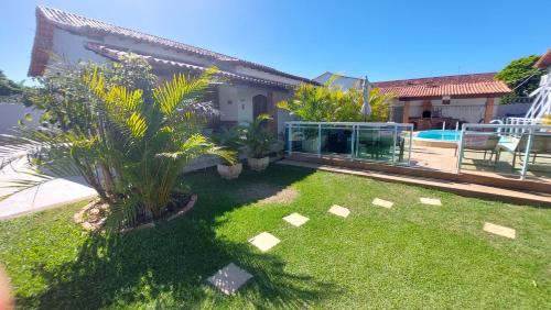 Taman di luar Village Itaúna Inn - Casas de Temporada para Famílias