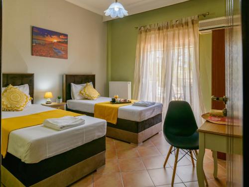 Posteľ alebo postele v izbe v ubytovaní Olive tree Apartment