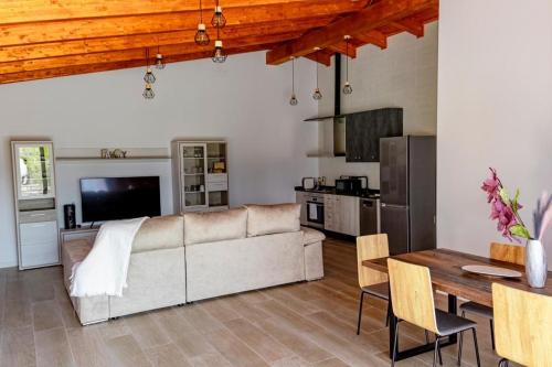 a living room with a couch and a table at Casas Cristea in Cehegín