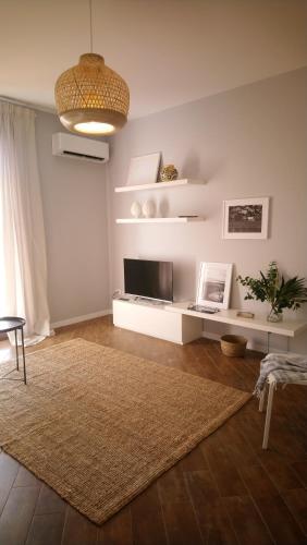 TV a/nebo společenská místnost v ubytování Loft 407