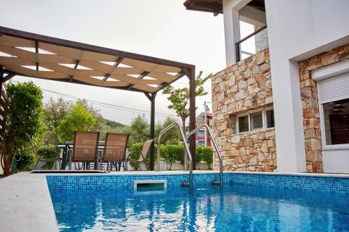 Πισίνα στο ή κοντά στο Petritis Villas