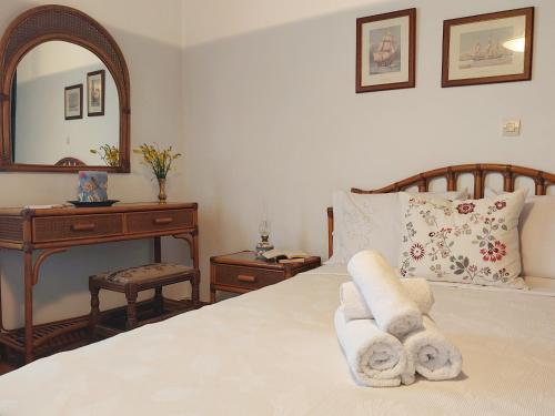 Ένα ή περισσότερα κρεβάτια σε δωμάτιο στο Village Sense, Pergola & Unlimited View