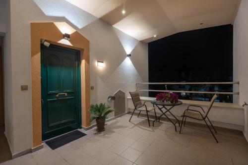 Posezení v ubytování Aphrodite Apartment ideal for holidays in Siviri