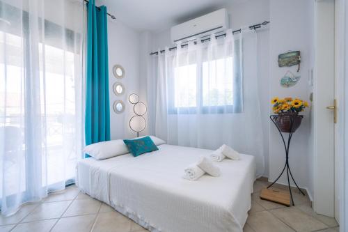 Postel nebo postele na pokoji v ubytování Aphrodite Apartment ideal for holidays in Siviri