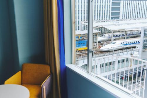a view of a train station from a window at Miyako Hotel Kyoto Hachijo in Kyoto