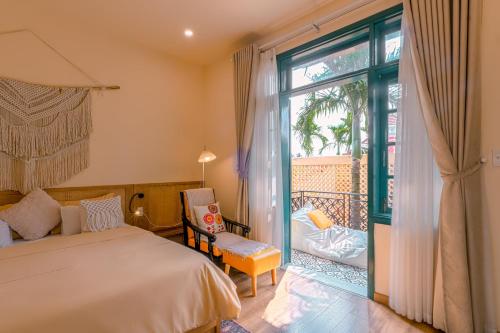 Cama o camas de una habitación en Alsahar Hoi An Boutique Villa