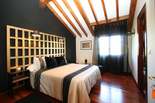 Кровать или кровати в номере Posada El Jardin