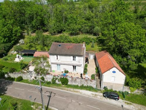 an aerial view of a house with a stone wall at LA PROVIDENCE, chambres d'hôtes in Saint-Sernin-du-Plain