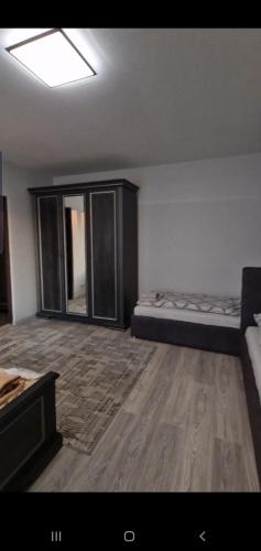 an empty room with a bed in a room at Верховина in Uzhhorod