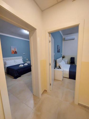 Cama o camas de una habitación en Bonaini Relax B&B