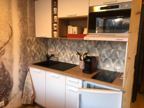 Photo de la galerie de l'établissement L'OURALOU - Vue panoramique, aux Gets