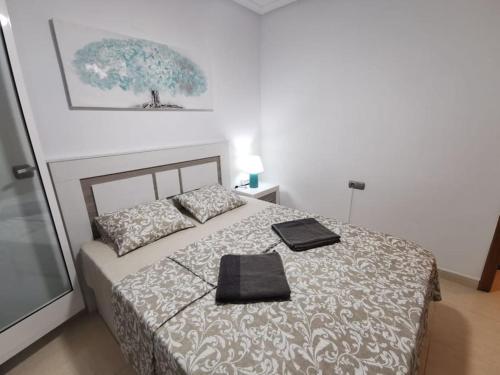 Postel nebo postele na pokoji v ubytování Apartamento Playa Cura