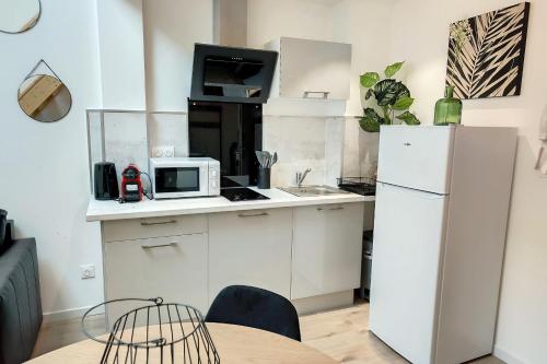 Η κουζίνα ή μικρή κουζίνα στο Sublime appart rénové duplex centre ville 4pers wifi