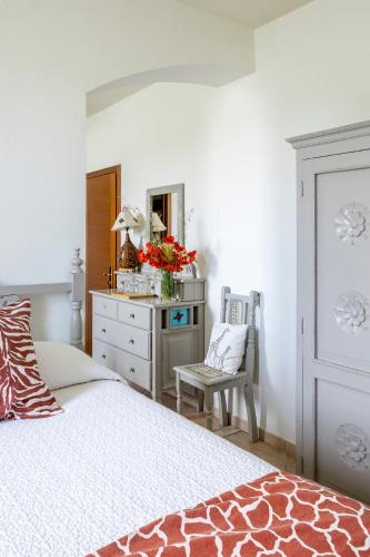 Ένα ή περισσότερα κρεβάτια σε δωμάτιο στο Relais Ca' Maddalena