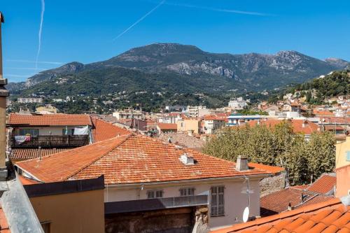 Between the roofs of Menton old town and the sea