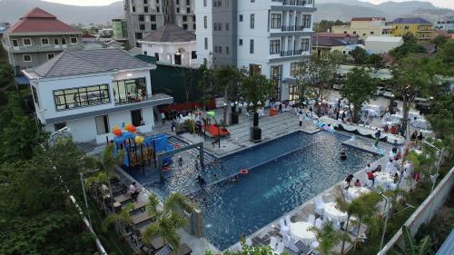 an overhead view of a swimming pool in a city at Romano Hotel in Kampot