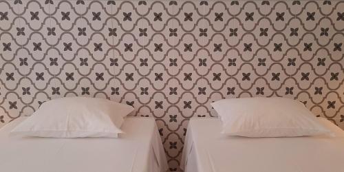 Postel nebo postele na pokoji v ubytování Hostel A Casa da Árvore