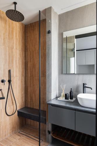 a bathroom with a sink and a mirror at Old North New&Amazing by TLV2RENT in Tel Aviv