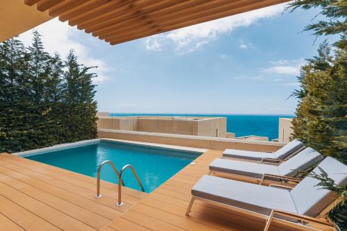 Πισίνα στο ή κοντά στο Villa Eos Green Coast Palase