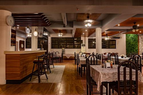 Restoran atau tempat lain untuk makan di Kiwi Hotel