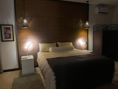 Ένα ή περισσότερα κρεβάτια σε δωμάτιο στο The Cosy New Appartement Fisherman