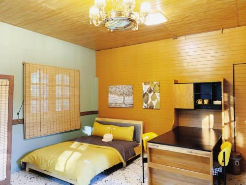 Postel nebo postele na pokoji v ubytování Mana-An Lake Hill Resort Apartment
