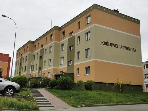 a building with the words kostholm living room ra at Apartament Królowej Jadwigi in Iława