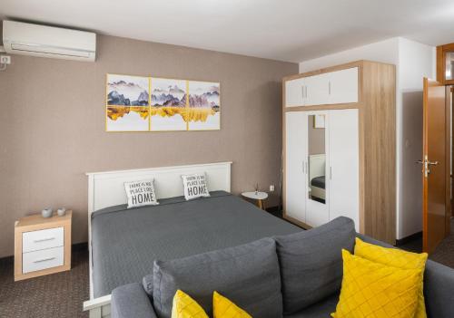 Ένα ή περισσότερα κρεβάτια σε δωμάτιο στο Apartment Titanic 3