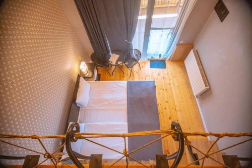 Ein Bett oder Betten in einem Zimmer der Unterkunft Vache Hotel