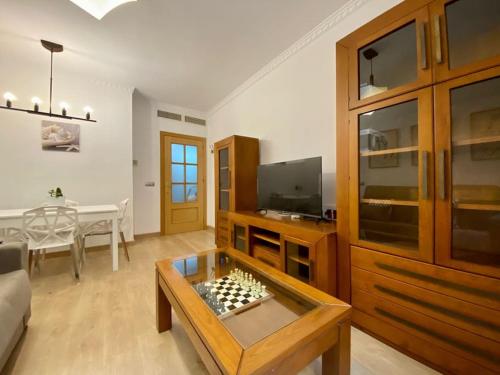 Televízia a/alebo spoločenská miestnosť v ubytovaní Piso acogedor en Málaga