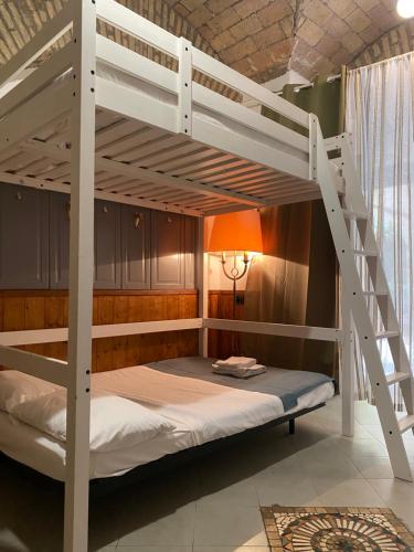 Posteľ alebo postele v izbe v ubytovaní mini Apartment