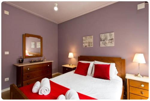 Postel nebo postele na pokoji v ubytování Porto Village Inn