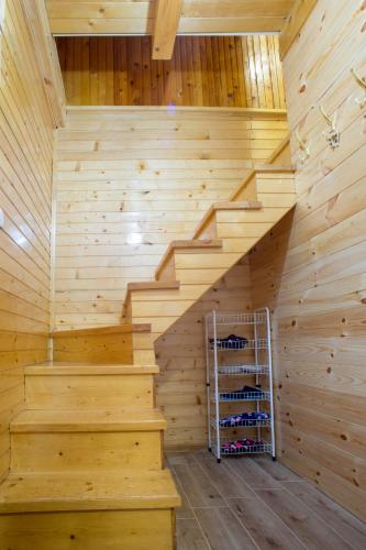 a sauna with stairs in a wooden wall at Fenix in Žabljak