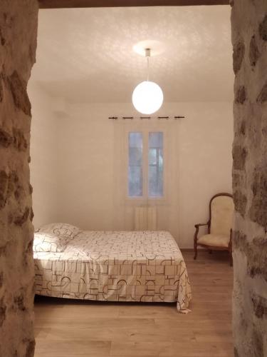 Postel nebo postele na pokoji v ubytování Maison blanche écoresponsable