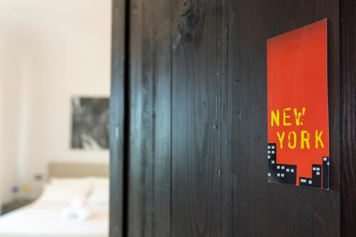 a door with a new work sign on it at Casa De Campo in Mosciano SantʼAngelo