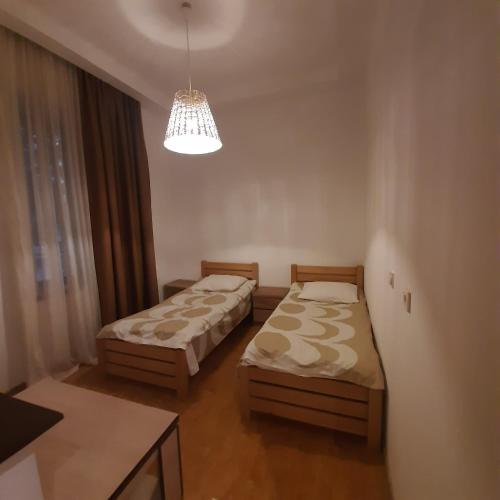 Una cama o camas en una habitación de Sanli