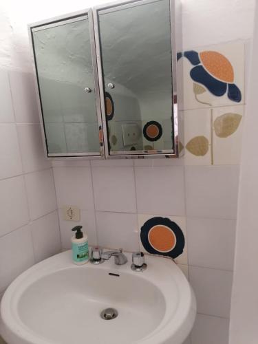 Un baño de Dalla Manu 1/2