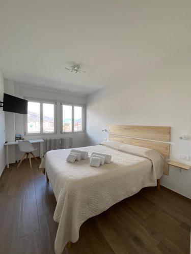 Katil atau katil-katil dalam bilik di Settimo Cielo Apartment Aosta CIR 0199