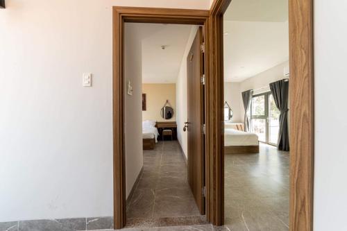 Postel nebo postele na pokoji v ubytování Sweet Home gần bãi sau