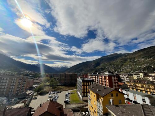a view of a city with mountains in the background at Settimo Cielo Apartment Aosta CIR 0199 in Aosta
