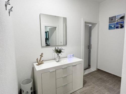 Kúpeľňa v ubytovaní Apartments T&T