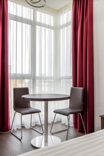 Гостиная зона в barasport city apartments