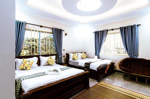 Posteľ alebo postele v izbe v ubytovaní Seagull Guesthouse Kampot