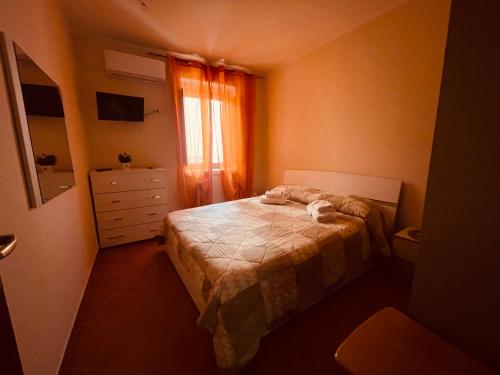 Postel nebo postele na pokoji v ubytování Da Nonna Pasqualina